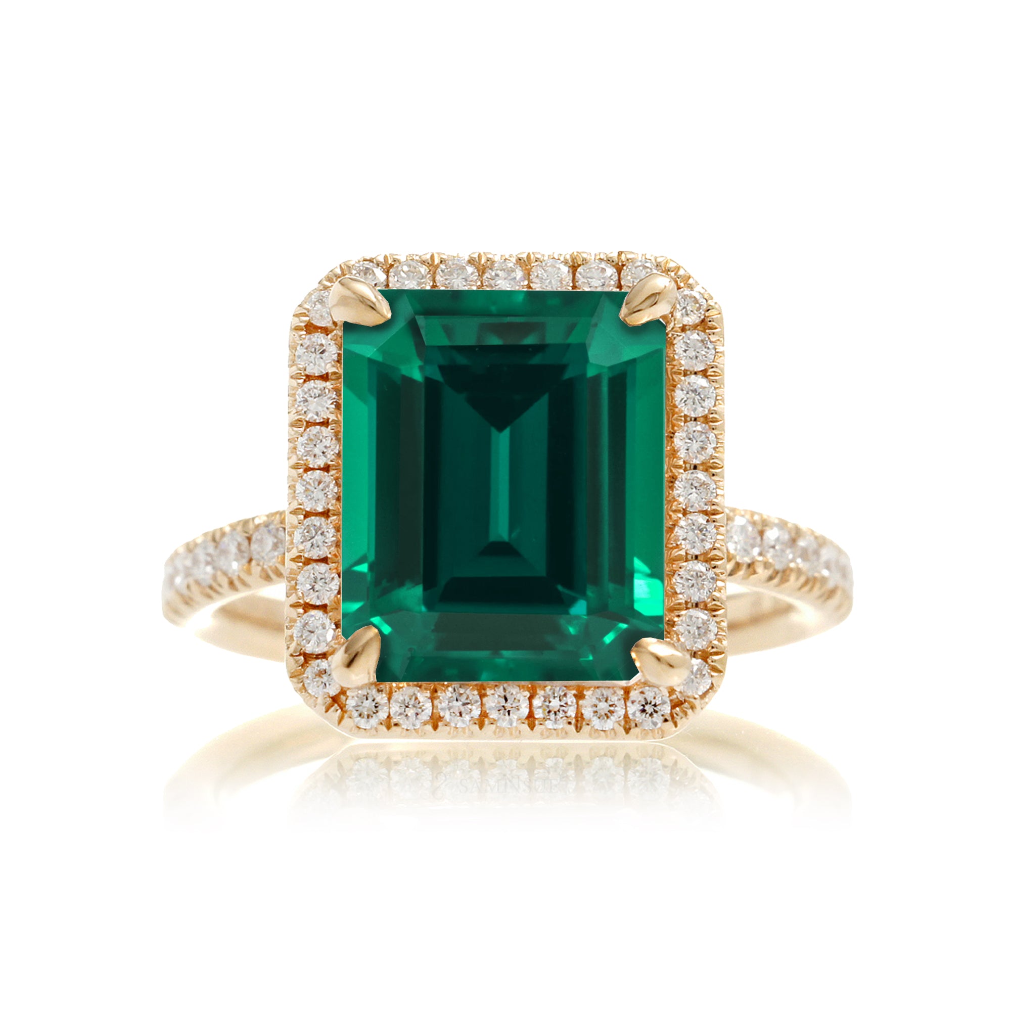 Green emerald engagement ring with emerald cut center stone diamond halo the Drenched yellow gold