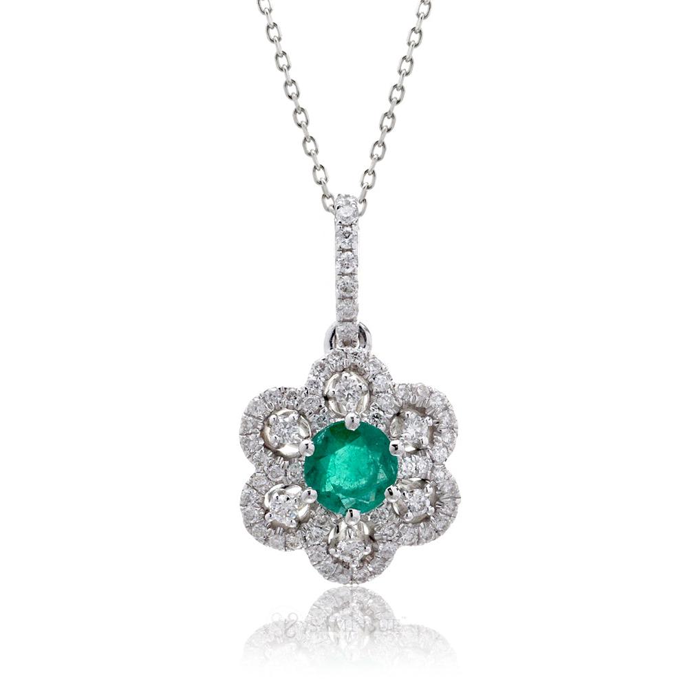 Natural round emerald with a diamond floral halo design pendant.