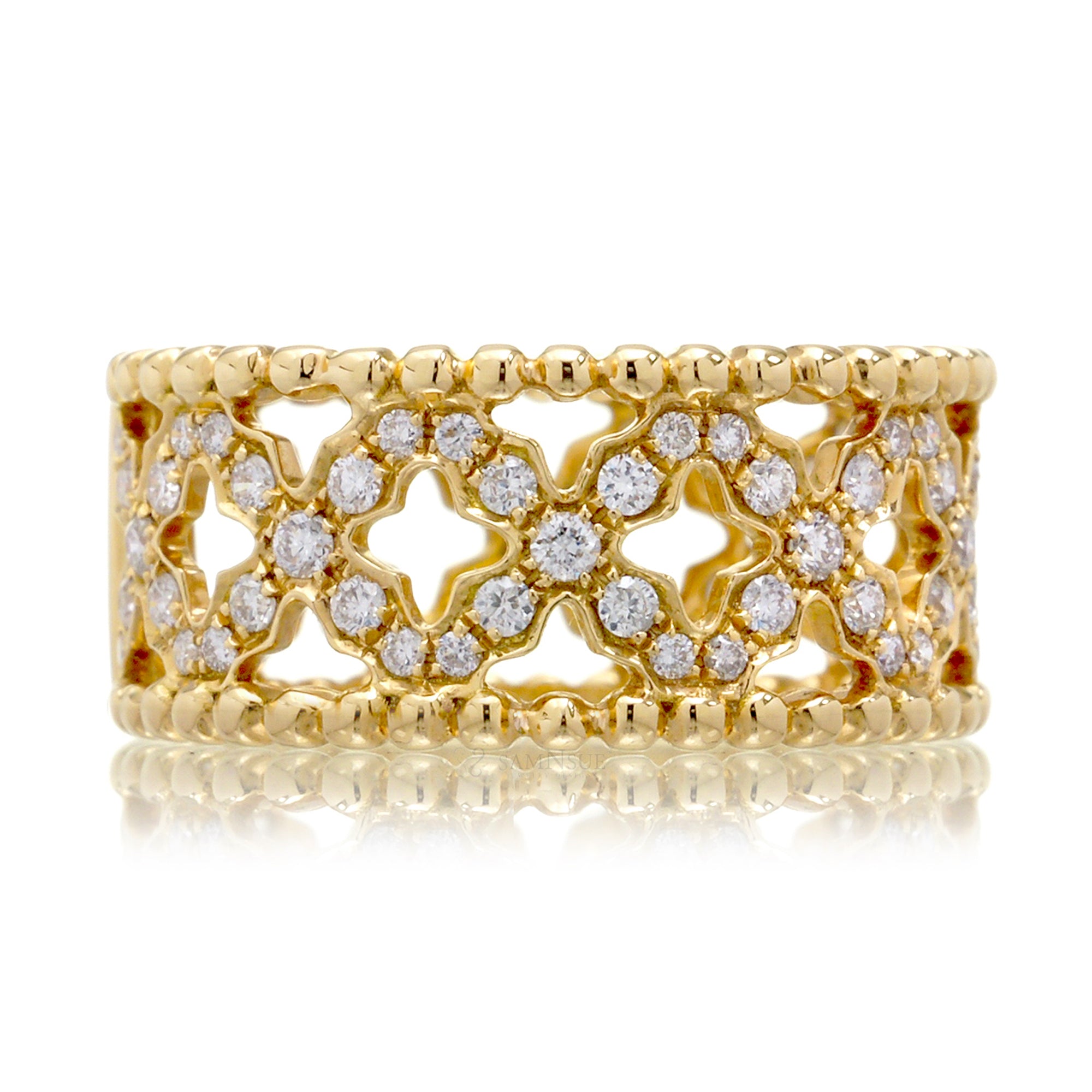 Diamond eternity band in yellow gold with beads and criss cross clover pattern