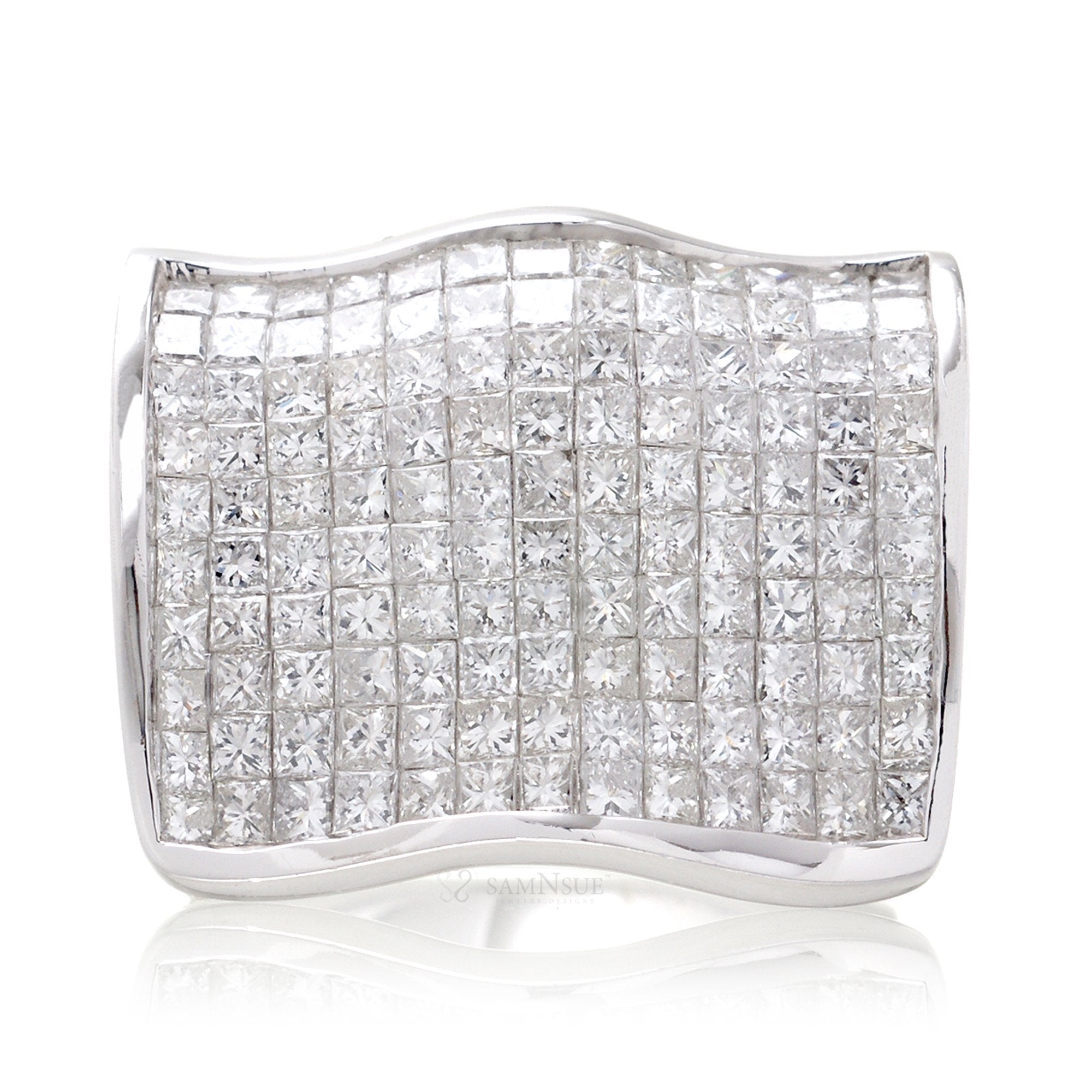 Unique diamond band with princess cut diamonds in a floating invisible setting white gold