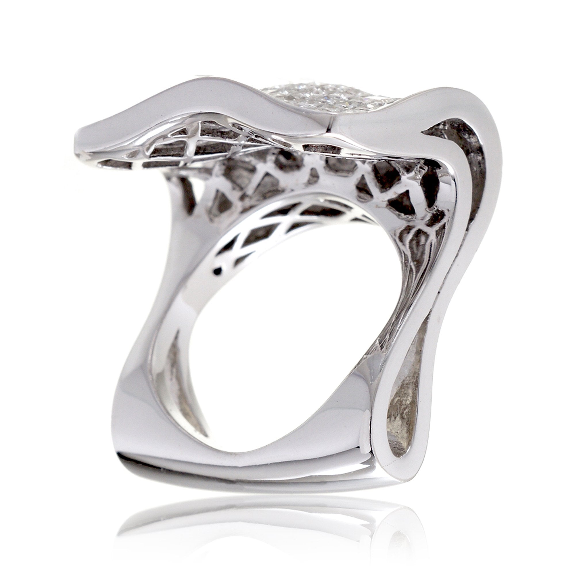 Unique diamond band with princess cut diamonds in a floating invisible setting white gold