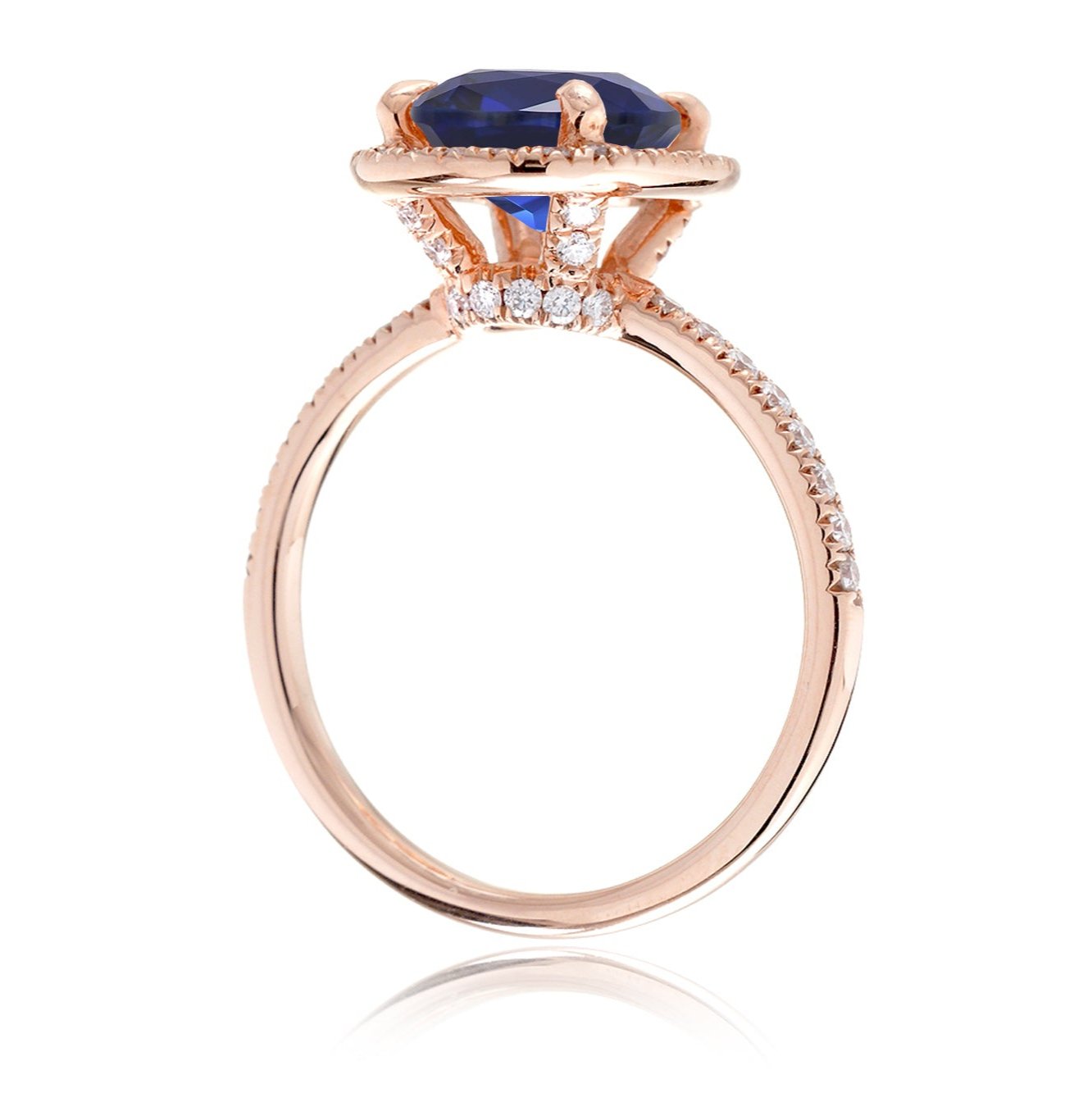 Oval sapphire diamond halo and band wedding rings rose gold side view