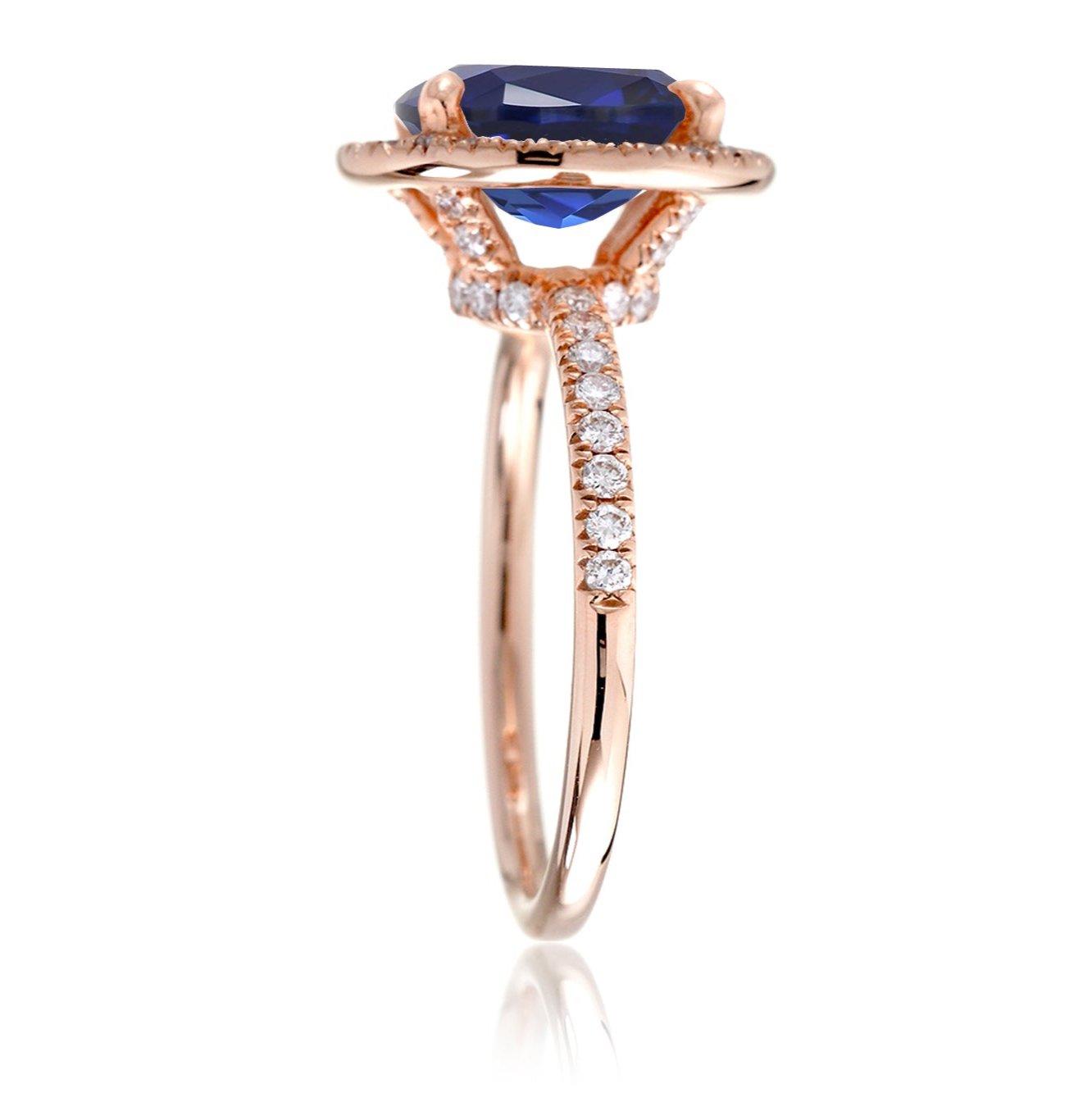 Oval sapphire diamond halo and band wedding rings rose gold profile view