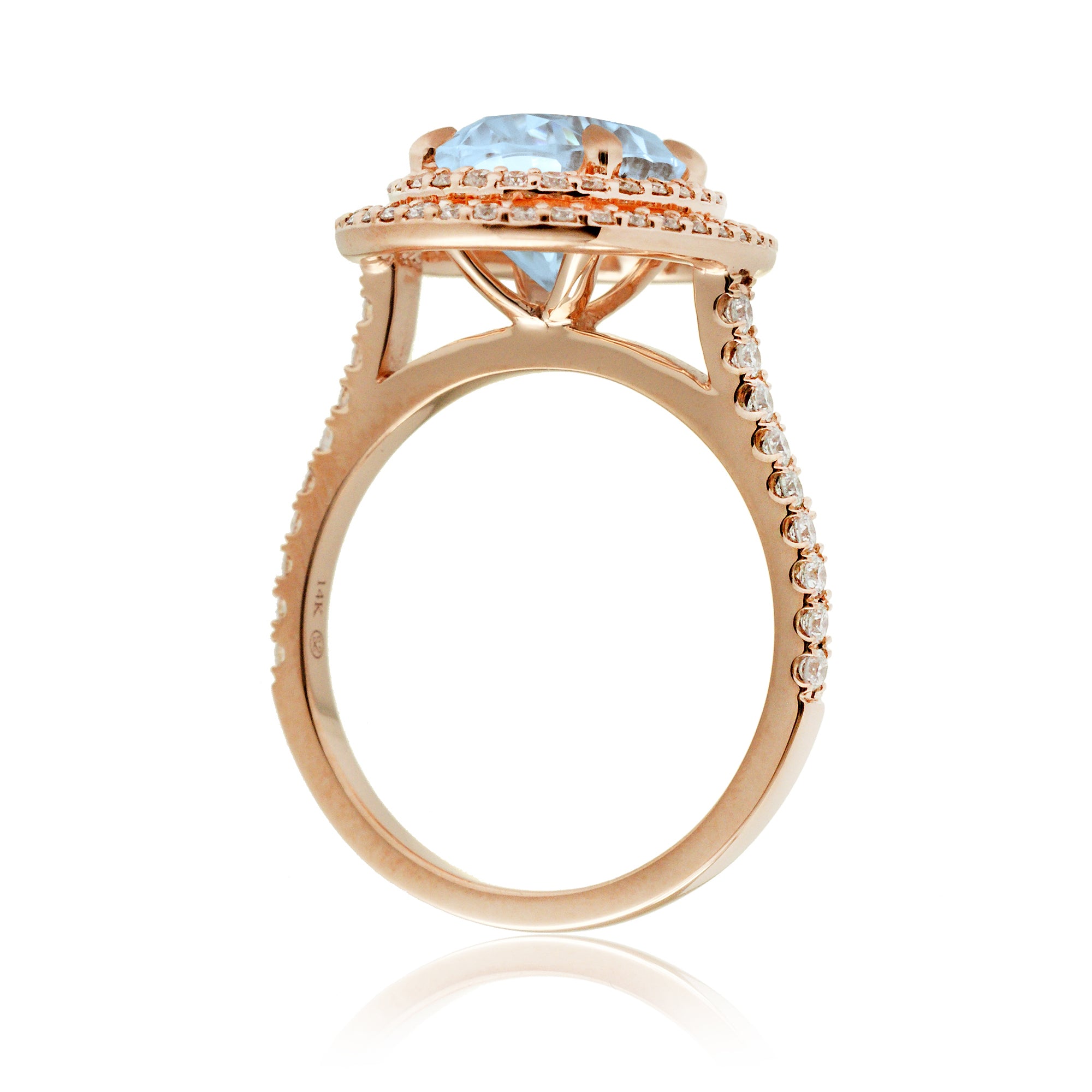 Oval cut aquamarine ring with double halo diamond band in rose gold