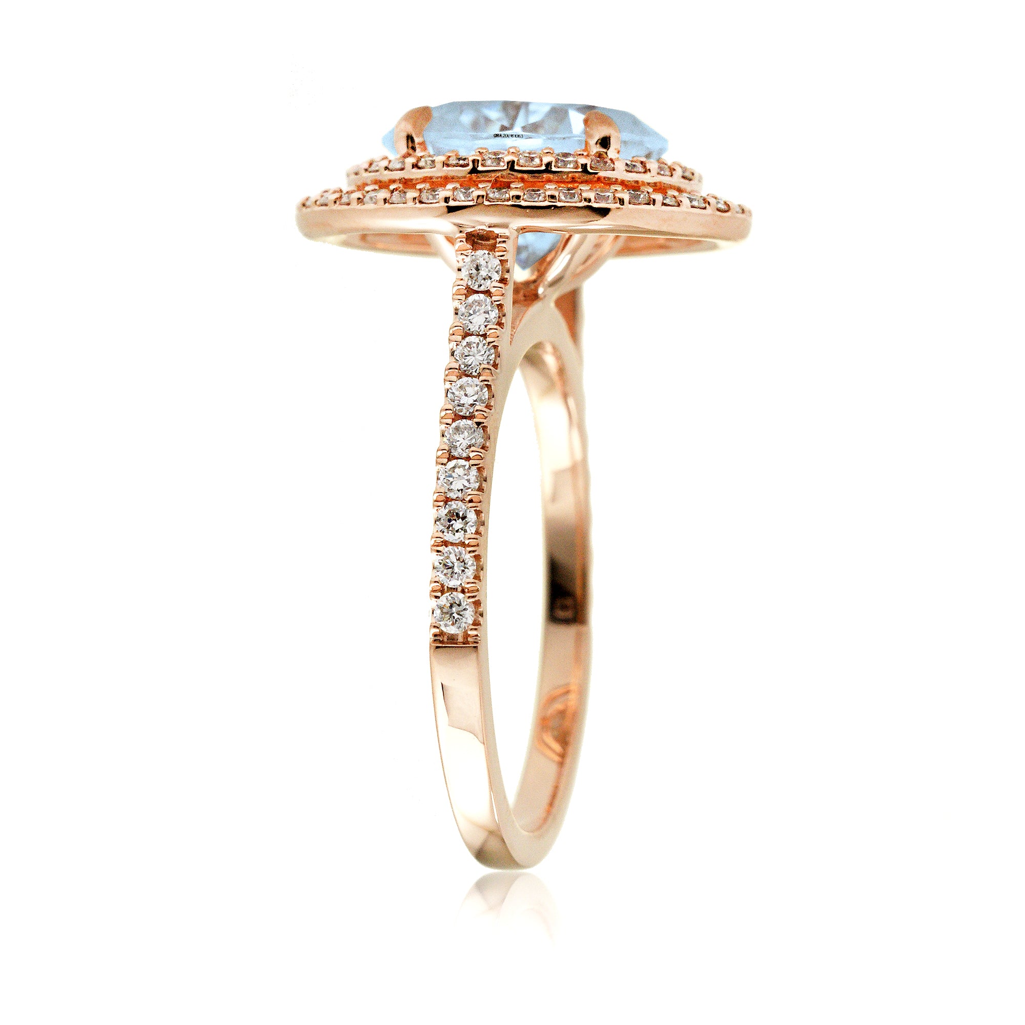 Oval cut aquamarine ring with double halo diamond band in rose gold