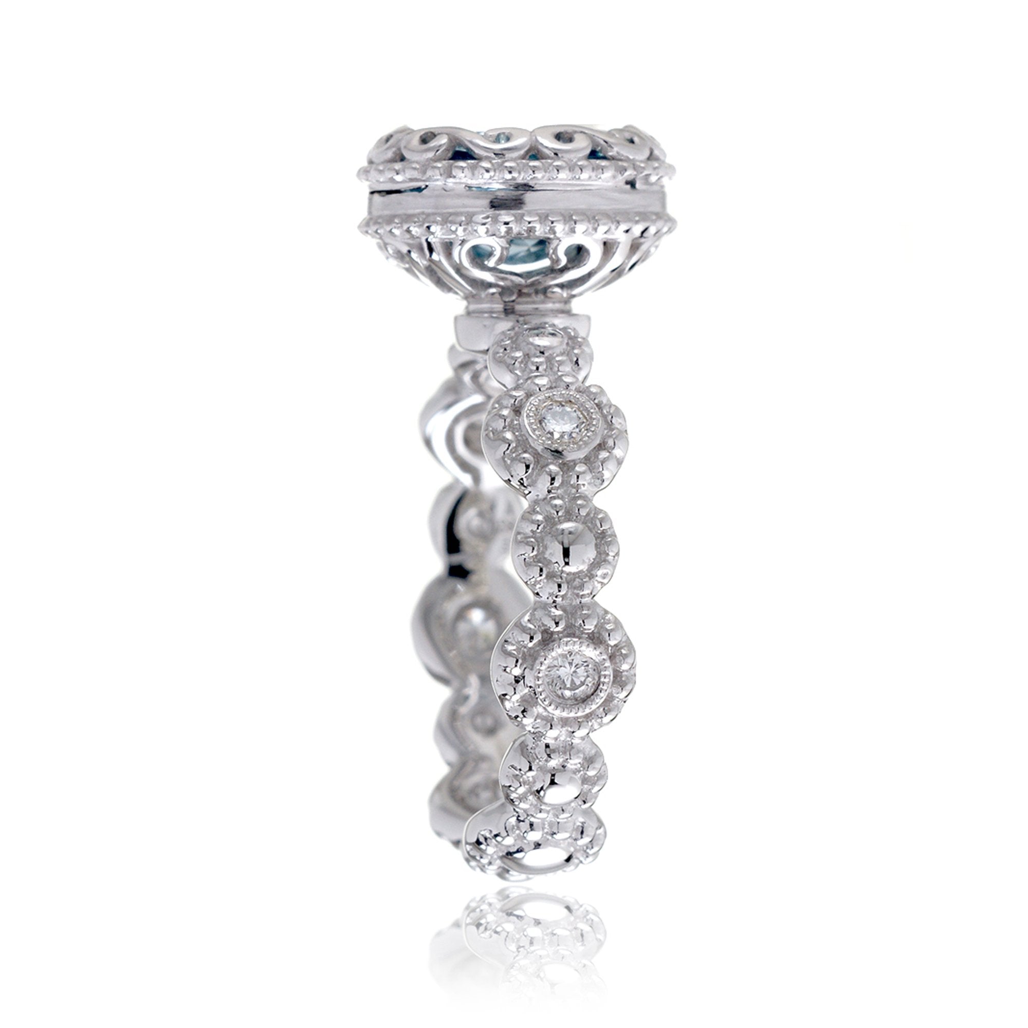 Oval aquamarine bezel set eternity floral diamond band style ring