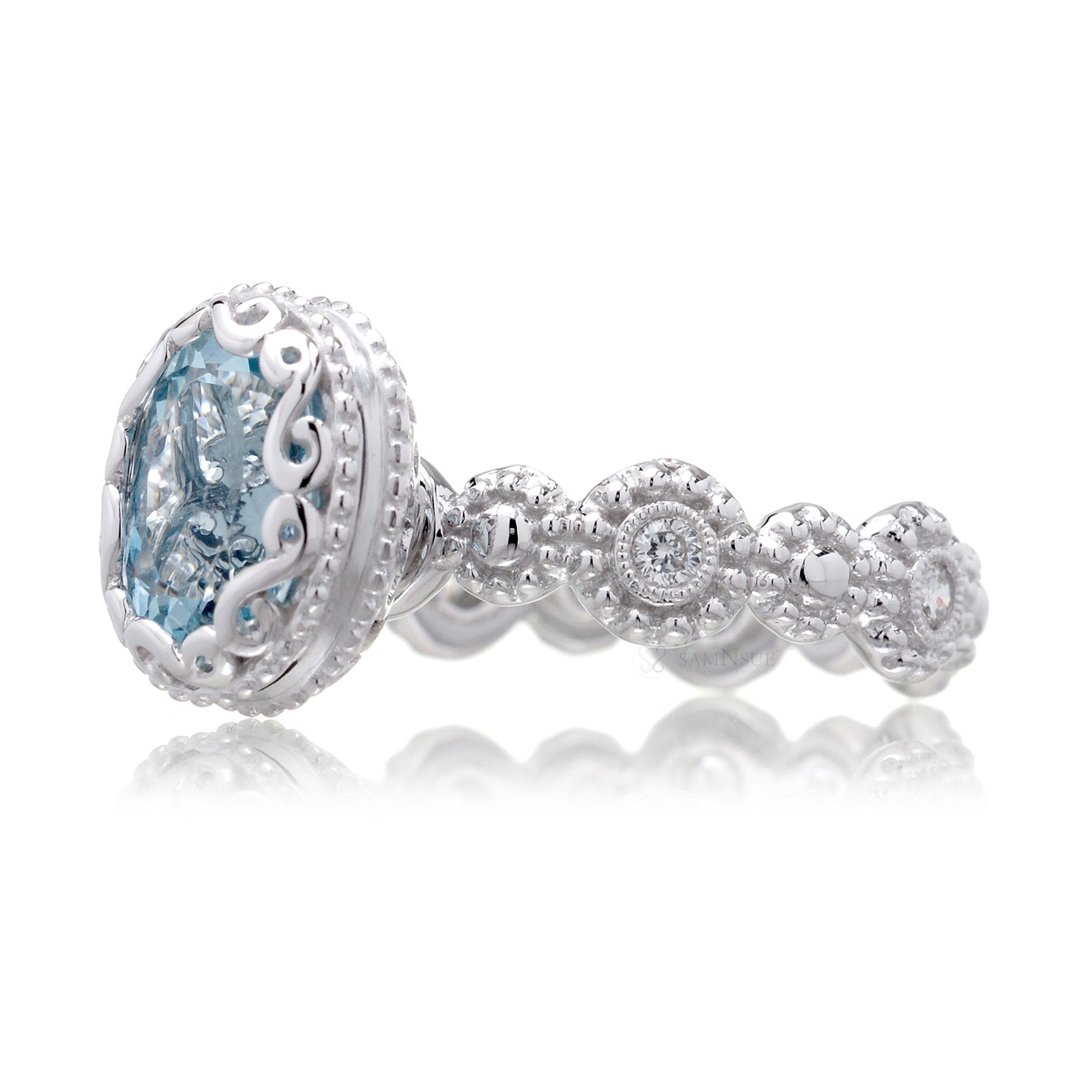 Oval aquamarine bezel set eternity floral diamond band style ring