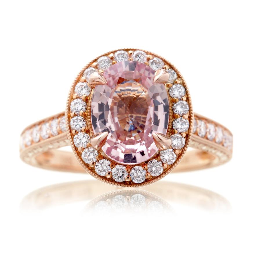 Pink sapphire and diamond vintage style rose gold engagement with halo and carving