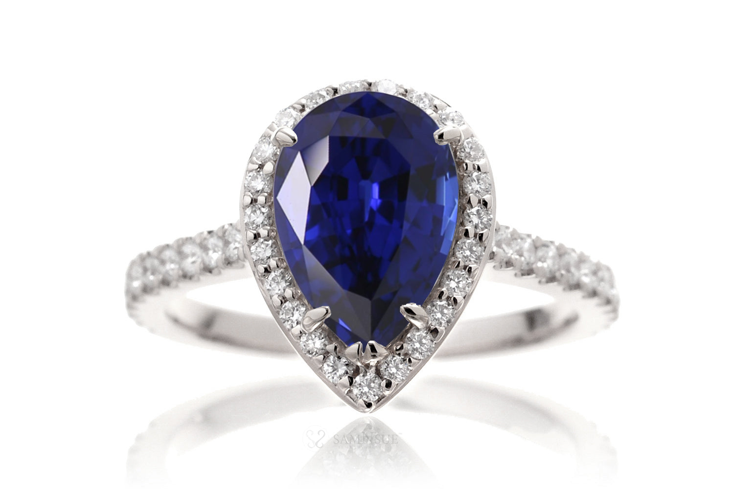Woman Sapphire Engagement Ring | Pear Shape Diamond Halo | The Sunset