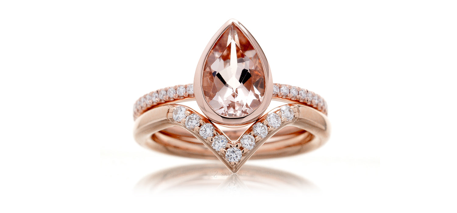 V shape diamond wedding band with a pear morganite engagement ring