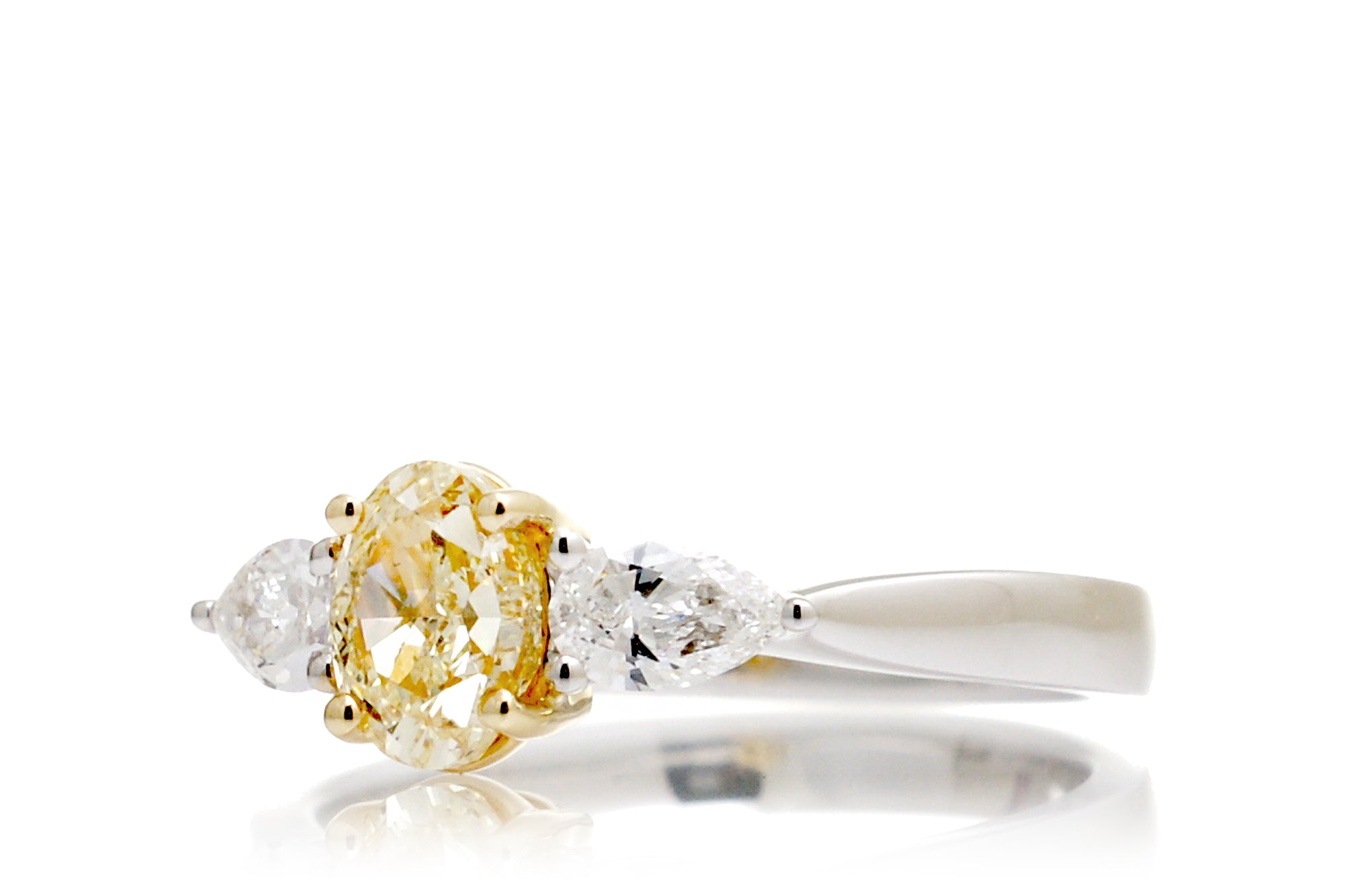 Three Stone Oval Natural Pear Fancy Yellow Diamond Ring