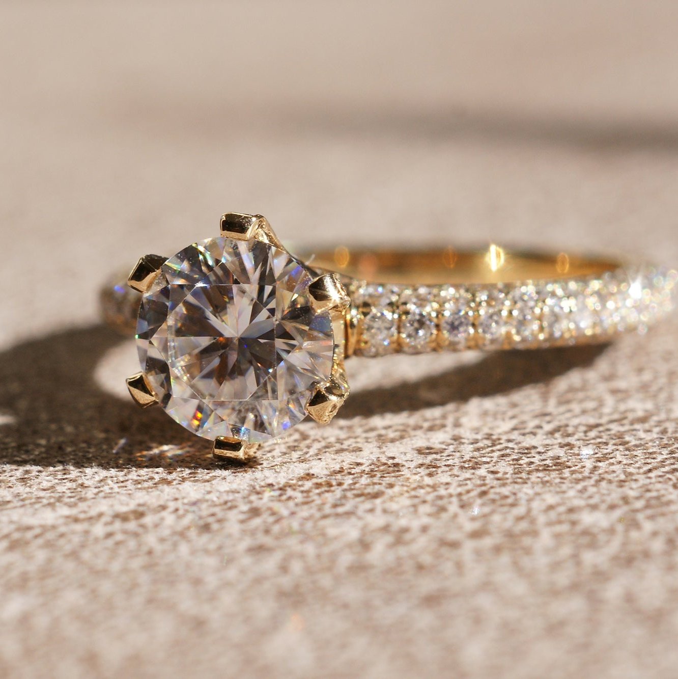 Pave diamond engagement ring with round center moissanite in rose gold