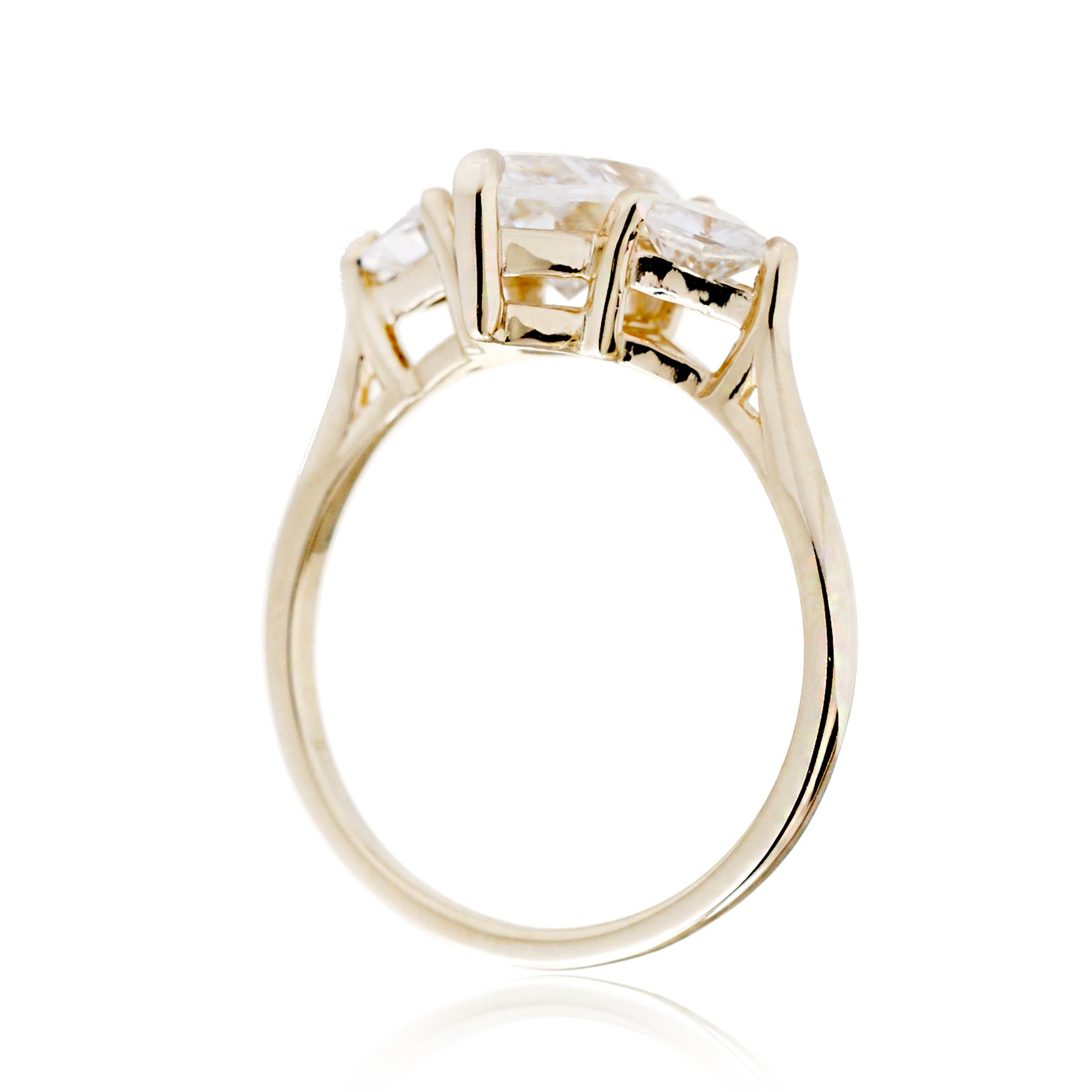 The Trillion Threestone Marquise Moissanite Ring